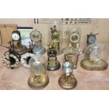 Collection of 12 Anniversary Clocks, 4 with Glass Domes