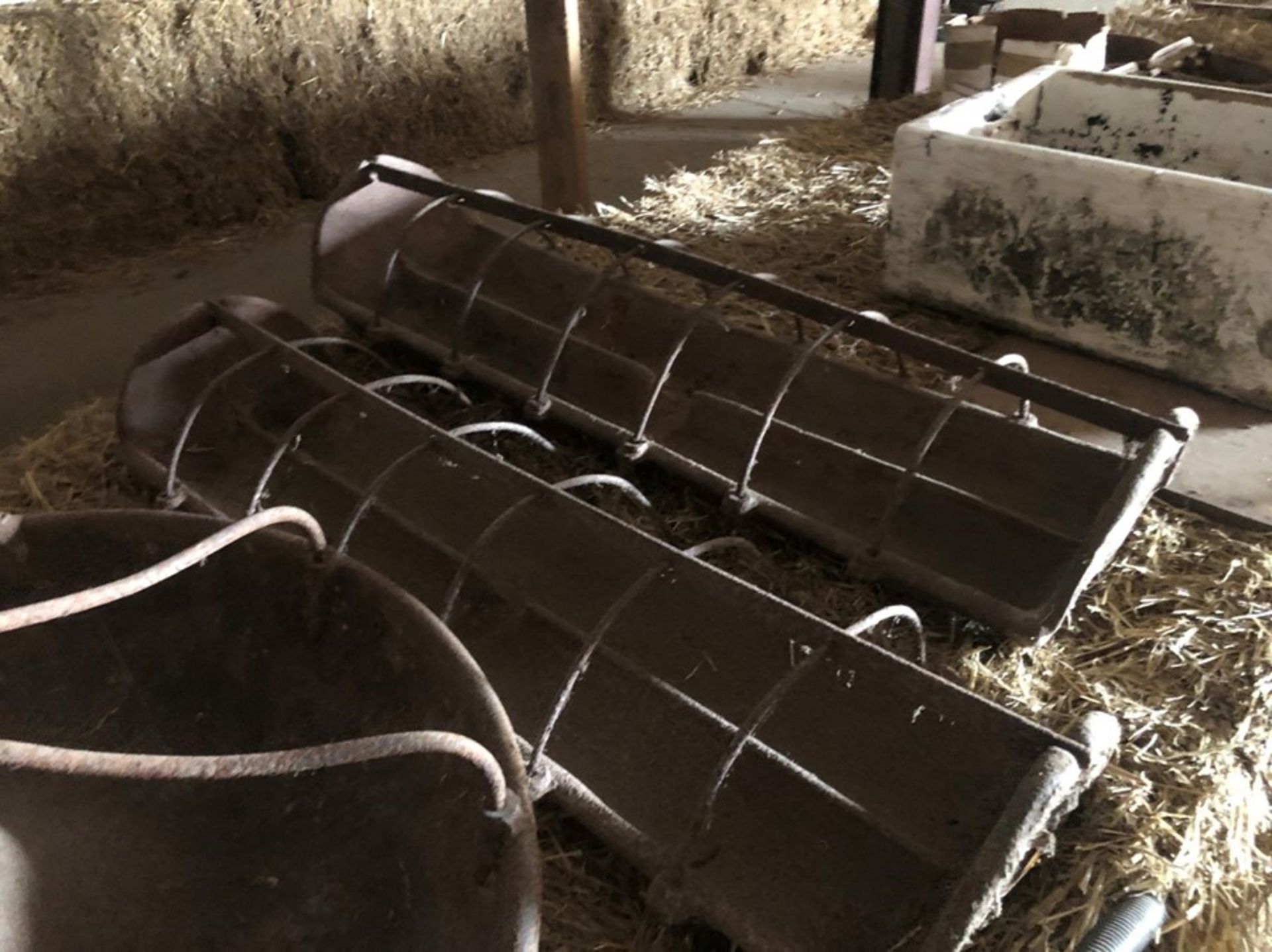 2 x cast iron pig troughs