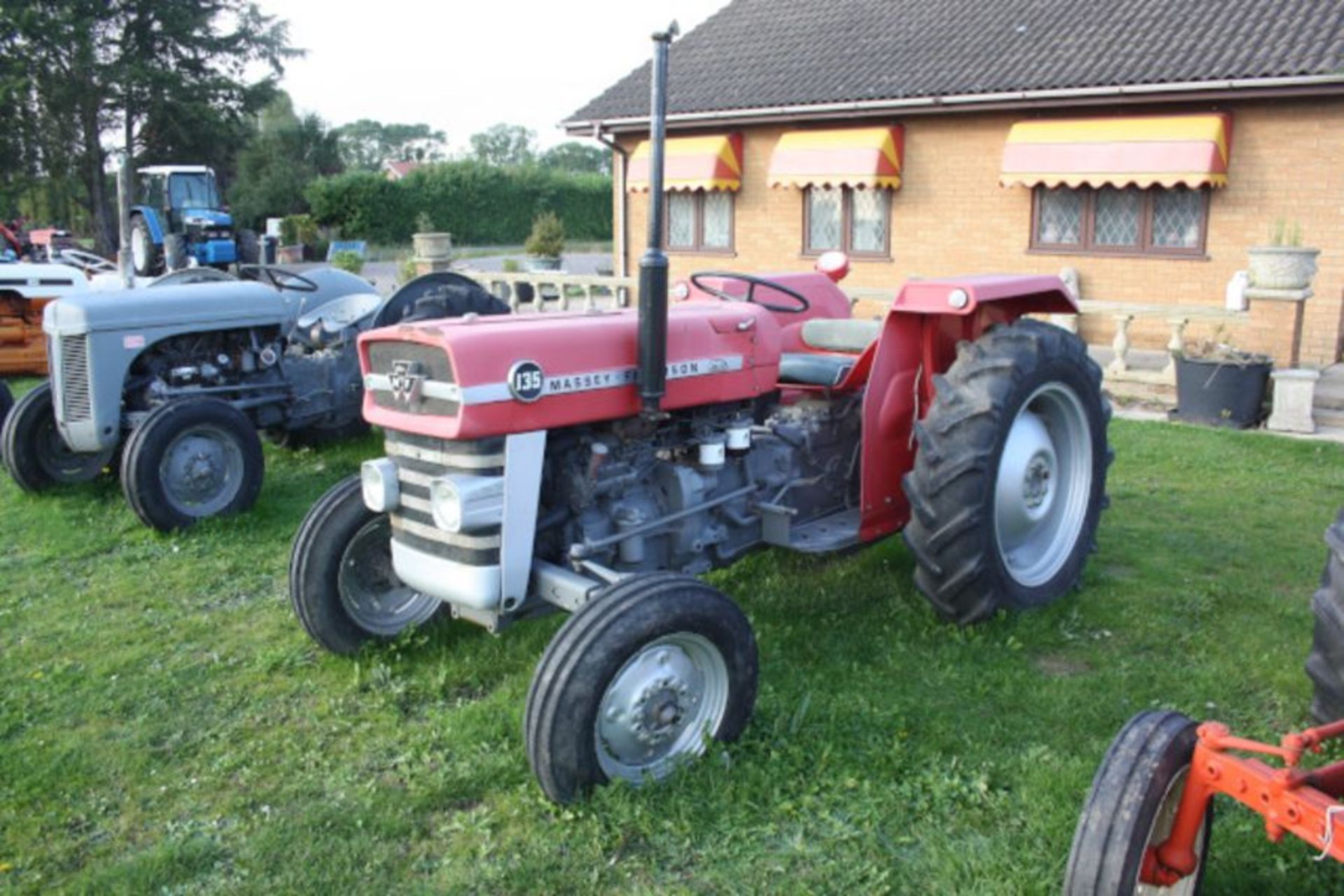 Massey Ferguson 135, straight front axle, new clock, with pick-up hitch, SN 424308. 12.4-28 rear