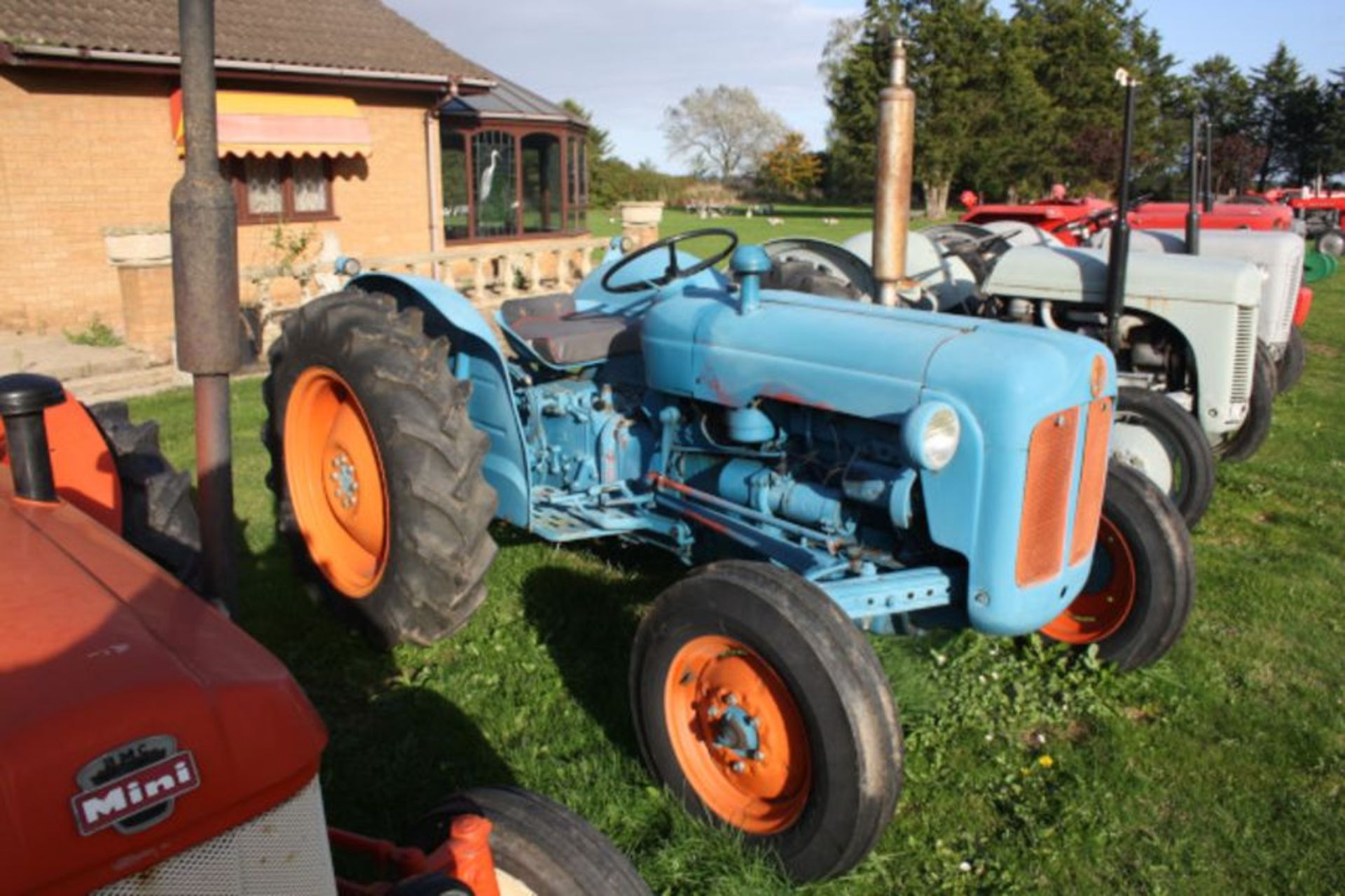 Fordson Dexta, Blue & Orange, new clock, with swinging draw bar. 12.4-28 rear tyres, 6.00-16 front