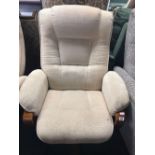 A CREAM CLOTH SWIVEL EASY CHAIR