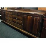 8ft ANTIQUE AFRICAN STINK WOOD SIDEBOARD WITH 8 DRAWERS & BRASS HANDLES