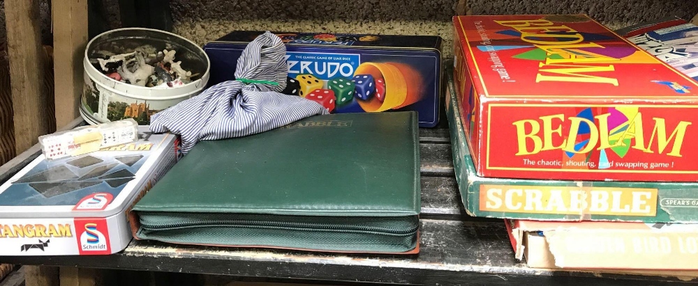 SHELF OF ASSORTED GAMES INCL; SCRABBLE, MONOPOLY ETC