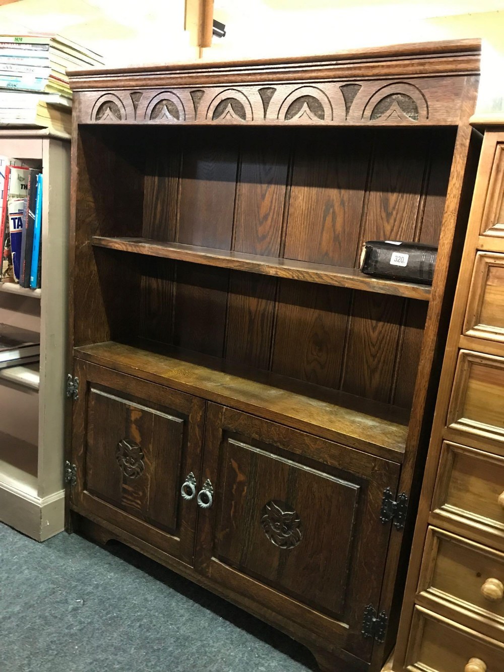 OAK CARVED BOOKCASE WITH 2 DOOR CUPBOARD