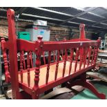 RED PAINTED SWINGING CRADLE