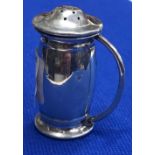 A SMALL SILVER PEPPER WITH 'C' SHAPED HANDLE- B'HAM 1916