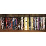 SHELF OF VARIOUS DVD'S