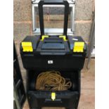 A STANLEY PLASTIC WHEELED TOOL CARRIER & CONTENTS