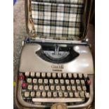 VINTAGE OLIVER COURIER PORTABLE TYPEWRITER IN CARRYING CASE