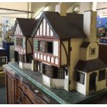 LARGE TUDOR STYLE DOLLS HOUSE(SOME WORM HOLES) BOTH GABLE FRONTS FOLDING OUT, A/F IN NEED OF