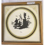 PAIR OF CIRCULAR SILHOUETTES OF FASHIONABLE SCENES.