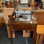 A PFAF ELECTRIC SEWING MACHINE IN TABLE (NEEDS TO BE RE-WIRED BY QUALIFIED ELECTRICIAN)