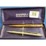 A SHEAFFER PROPELLING PENCIL & A ROLLED GOLD EXAMPLE