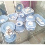 SHELF OF WEDGWOOD JASPER BLUE & WHITE WARE, TRINKET BOXES, CANDLE HOLDERS, CIGARETTE LIGHTER ETC