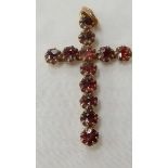9ct GOLD CRUCIFIX WITH 12 RED STONES (GARNETS?)