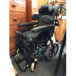 POWER ASSISTED WHEEL CHAIR MADE BY REA INVACARE AZALEA ASSIST WITH BLACK PADDED FOAM SEAT & HEAD