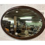 OVAL BEVELLED MIRROR WITH OAK SURROUND