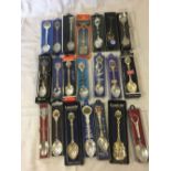 LARGE QTY OF WHITE & YELLOW METAL SOUVENIR TEA SPOONS