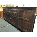 AN ERCOL OLD COLONIAL SIDEBOARD