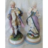 PAIR OF HEAVY CHINA FIGURES MALE & FEMALE IN 18TH CENTURY DRESS - BOTH HAVE MINOR DAMAGE- APPROX