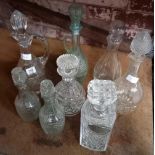 COLLECTION OF 8 GLASS DECANTERS