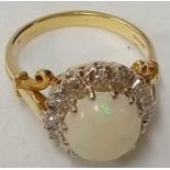 A GOOD OPAL & DIAMOND CLUSTER RING SET IN 18ct