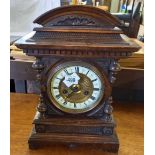 CARVED OAK GERMAN 14 DAY STRIKING MANTLE CLOCK WITH ENAMEL & BRASS FACE