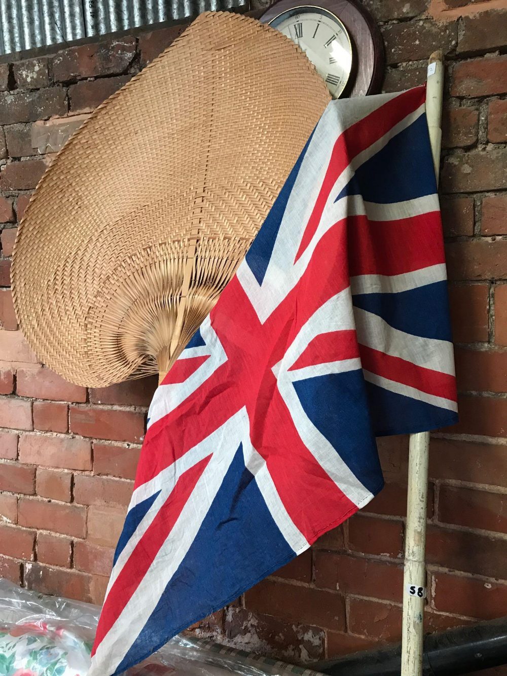 UNION JACK ON WOODEN POLE TOGETHER WITH A RAFFIA FAN