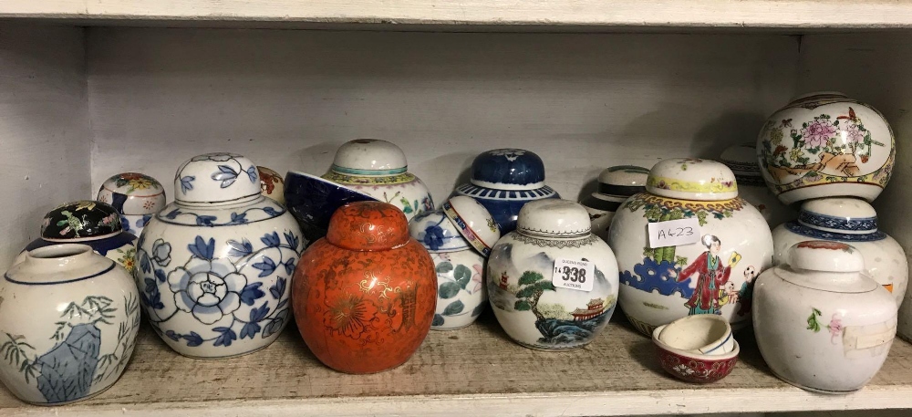 SHELF OF ORIENTAL JARS & LIDS