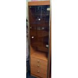 TALL NARROW GLASS FRONTED CABINET WITH 2 GLASS SHELVES & 3 DRAWERS, BRASS EDGING & INTERNAL LIGHT