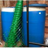 2 X LARGE BLUE WATER BUTTS WITH LIDS, LARGE ROLL OF PLASTIC GARDEN FENCING