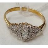 A 16 STONE CHESTER RING SET IN 9ct
