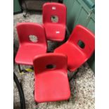 4 CHILD'S RED PLASTIC STACKING CHAIRS