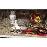 SHELF OF MIXED GLASSWARE, LARGE DECORATIVE PLATES, ITALIAN JUG WITH SUNFLOWERS & GLASS BOWL