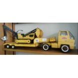 YELLOW SHEET METAL 'TONKA' TRANSPORTER WITH BULLDOZER / BACKHOE ON TRAILER