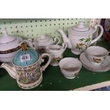 SHELF OF MIXED TEA POTS ETC