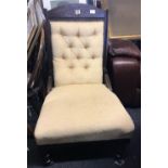 ANTIQUE UPHOLSTERED PUFFIN BACK CHAIR