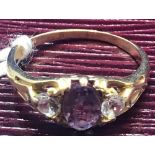 18ct PURPLE STONE RING W.T 4g