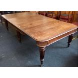 MAHOGANY EXTENDING DINING TABLE 8ft X 4ft APPROX ON TURNED & FLUTED LEGS & CASTERS