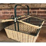 A LARGE WICKER WROUGHT IRON WORK PICNIC BASKET