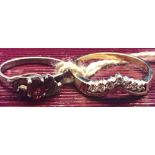 TWO SILVER MOUNTED RINGS