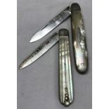 2 SILVER BLADED FRUIT KNIVES WITH M.O.P SCALES. 1867 & 1905 ONE BLADE WITH SLIGHT TWIST