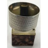 A STERLING SILVER NAPKIN RING IN BOX