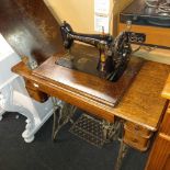 VINTAGE TREADLE SINGER SEWING MACHINE IN OAK & CAST IRON FRAME