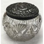AN EMBOSSED SILVER JAR WITH GLASS BODY - B'HAM 1904