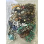 BAG OF COSTUME JEWELLERY, NECKLACES PENDANTS BRACELETS ETC