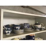 SHELF OF OLD WILLOW PATTERNED TEA WARE ETC
