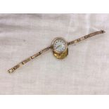 9ct CASED VINTAGE WATCH A/F ON EXPANDING BRACELET