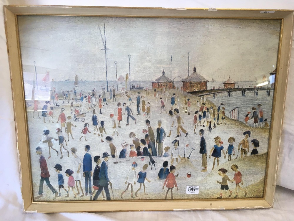 AN L.S LOWRY COLOUR PRINT OF A SEASIDE SCENE