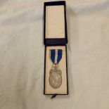 A SILVER MOSAIC MEDAL IN BOX